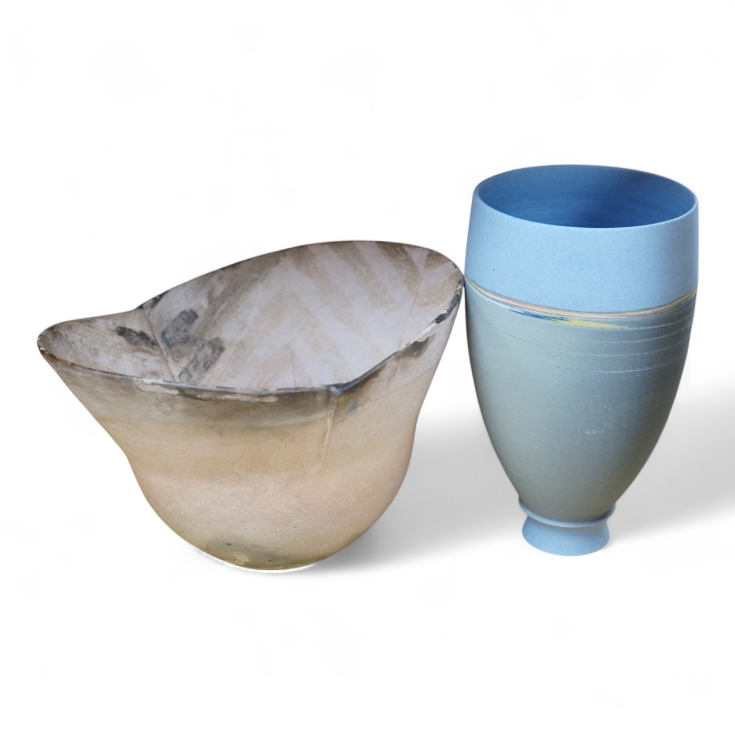 A studio pottery with incised initialled, dated ‘73 and a similar bowl, largest 21cm in diameter